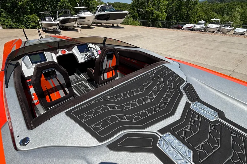 Slide: The Image of 2020 Eliminator 36 Daytona Coupe boat interior with sleek design and modern dashboard. - 9