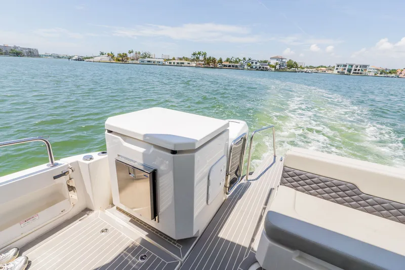 Slide: The Image of Aquila 36 Sport 2023 on water with coastal view. - 15