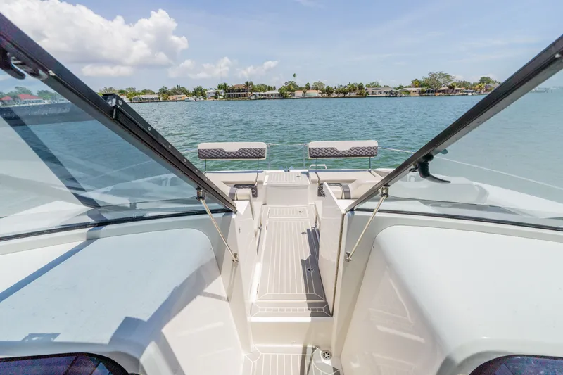 Slide: The Image of Aquila 36 Sport 2023 on calm waters with clear skies. - 29