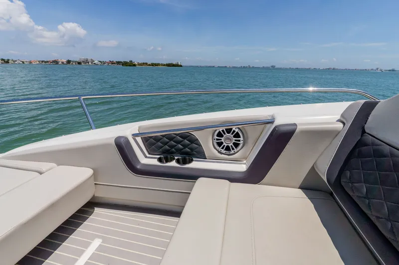 Slide: The Image of Aquila 36 Sport 2023 boat with luxurious seating and ocean view. - 34