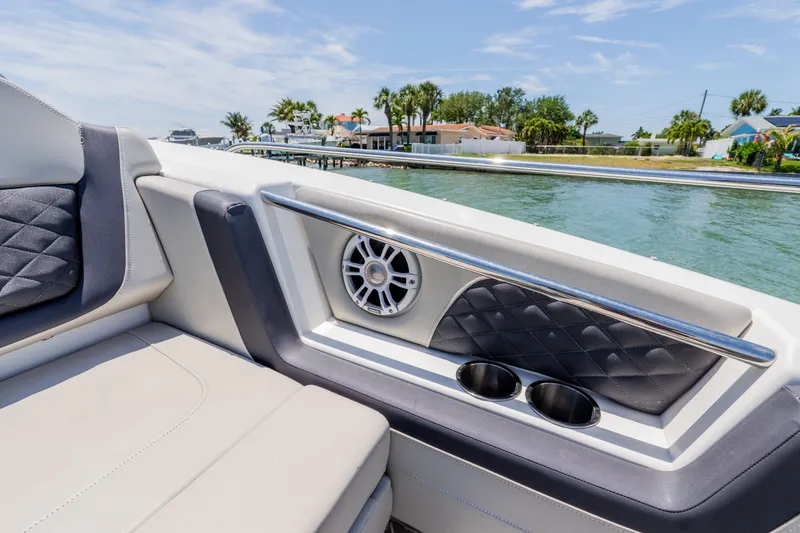 Slide: The Image of Interior of 2023 Aquila 36 Sport with speaker and cup holders. - 35