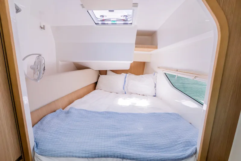 Slide: The Image of Interior of 2023 Aquila 36 Sport with cozy bed. - 38