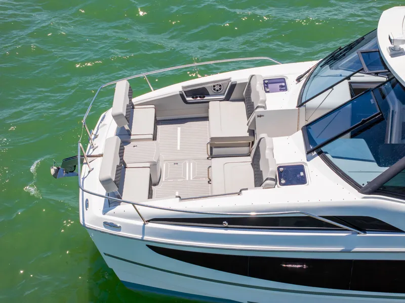Slide: The Image of Aquila 36 Sport 2023 on calm water, modern design. - 4