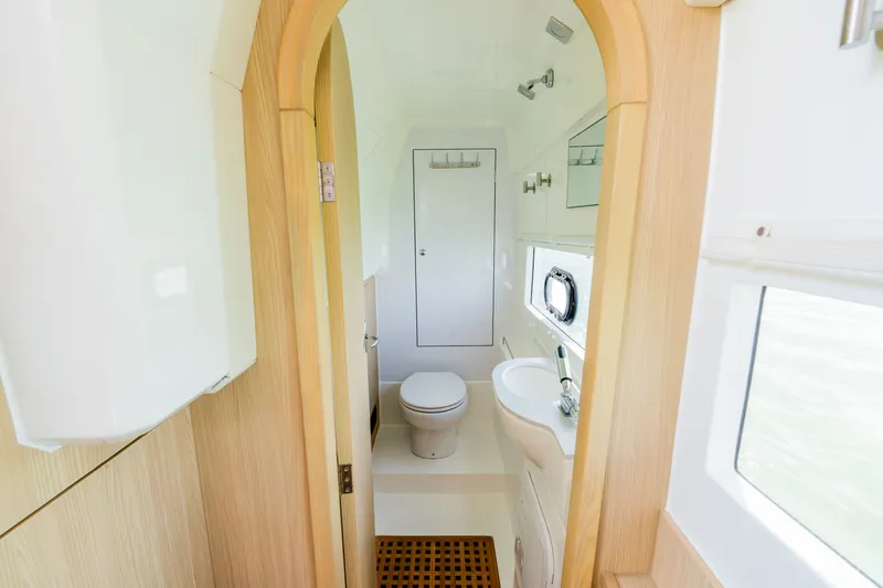 Slide: The Image of Interior view of Aquila 36 Sport 2023 yacht bathroom. - 42