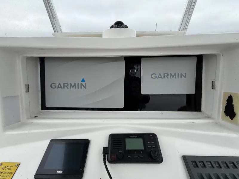 Slide: The Image of Garmin navigation systems on a 2022 NorthCoast 230 CC boat. - 13