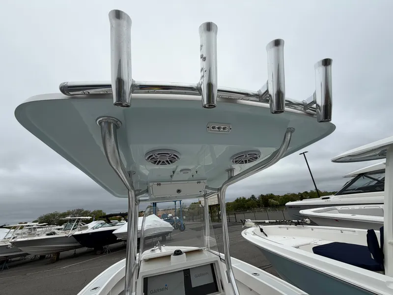 Slide: The Image of 2022 NorthCoast 230 CC boat with stainless steel T-top and Garmin equipment. - 16