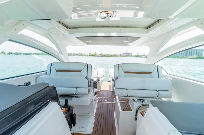 Slide: The Image of Interior of 2020 Tiara Yachts 34lx with luxurious seating. - 24