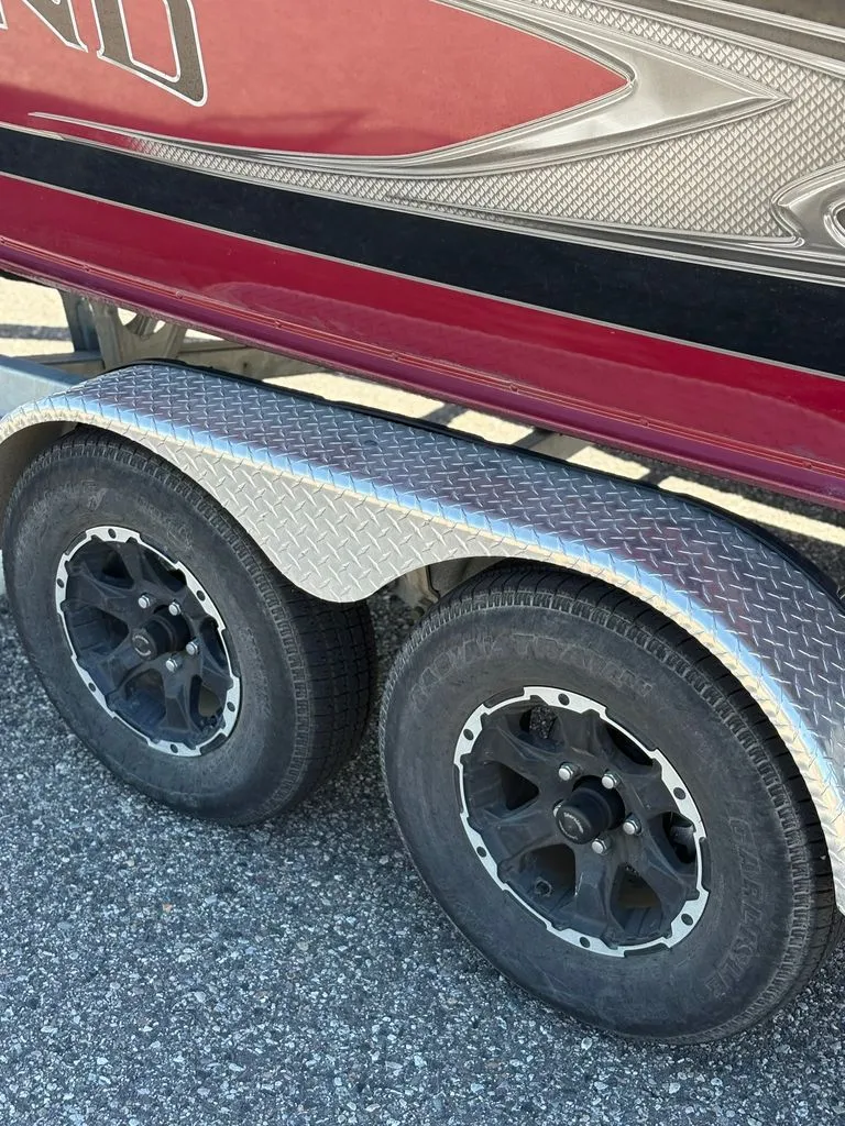 Slide: The Image of 2017 Lund 1875 Crossover XS boat trailer with dual wheels. - 14
