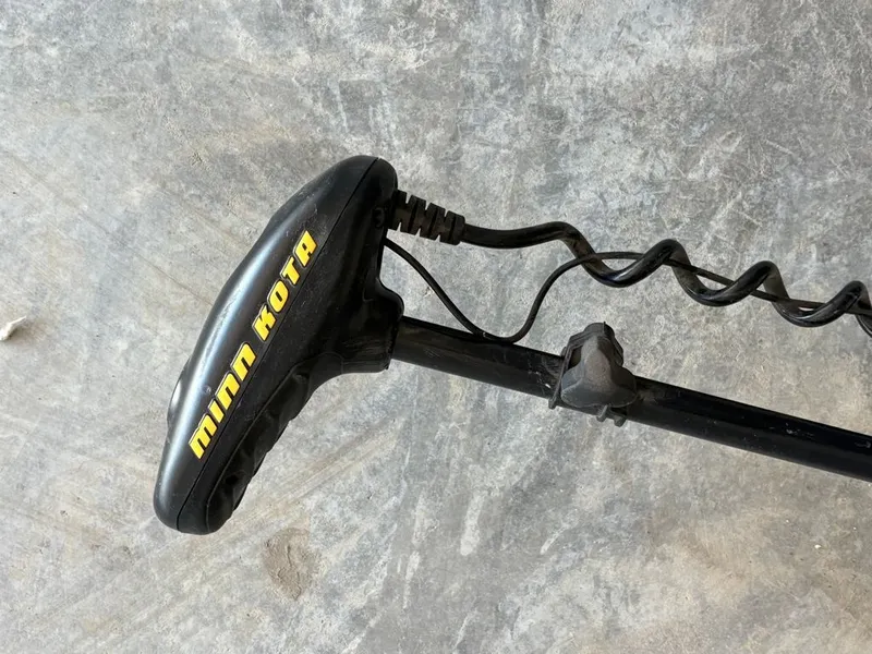 Slide: The Image of Minn Kota trolling motor on concrete floor, close-up. - 17