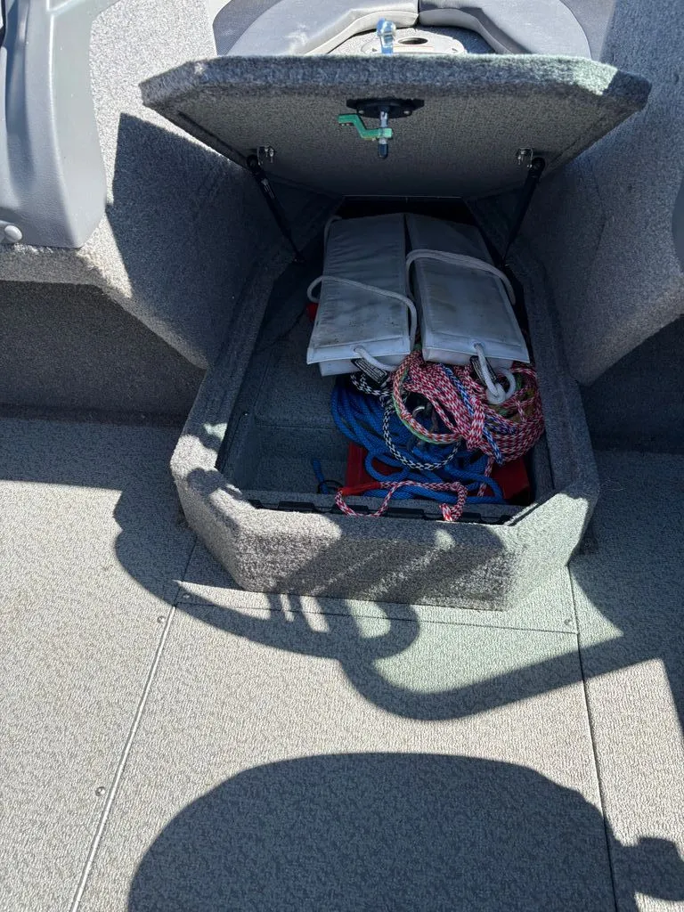 Slide: The Image of Lund 1875 Crossover XS 2017 storage compartment with ropes and accessories. - 7