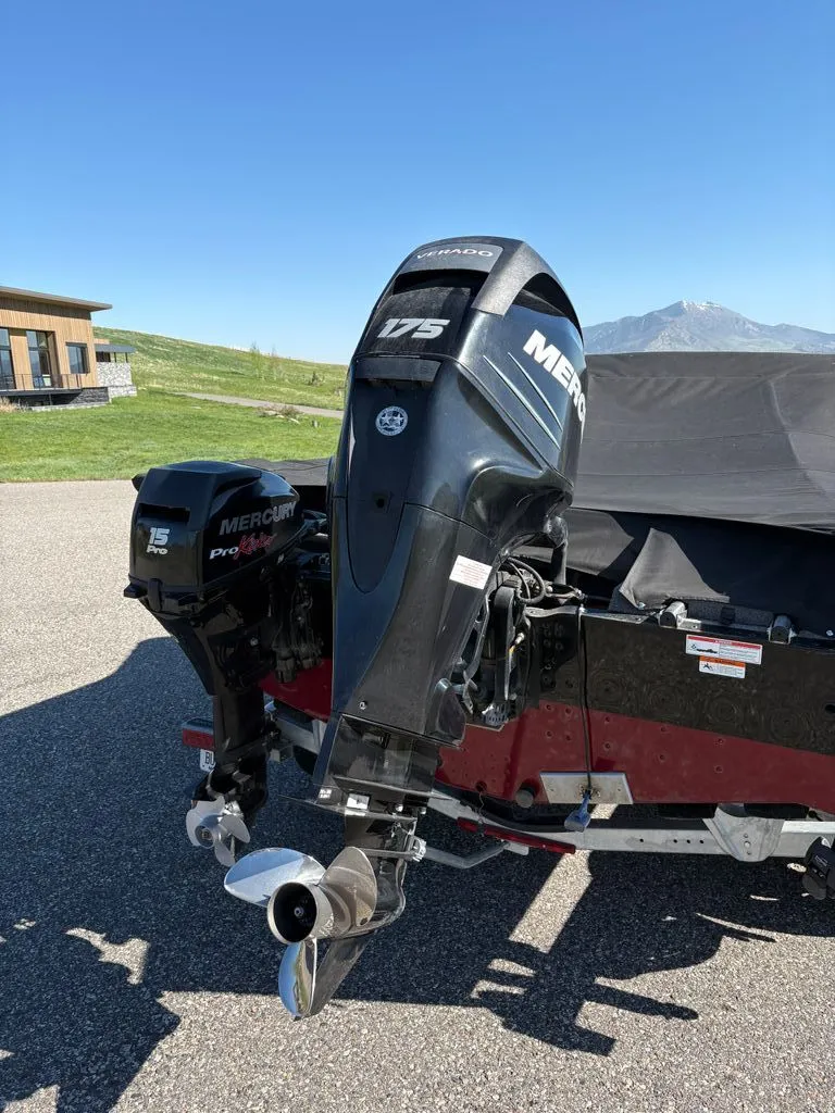 Slide: The Image of 2017 Lund 1875 Crossover XS with Mercury engines outdoors. - 9