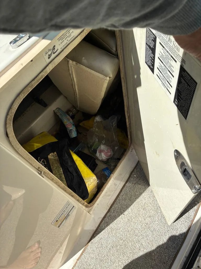 Slide: The Image of Storage compartment in a 2005 Sea Ray 200 Sundeck boat. - 10