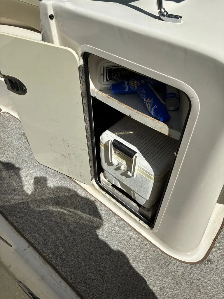 Slide: The Image of Storage compartment in Sea Ray 200 Sundeck boat, 2005 model. - 11