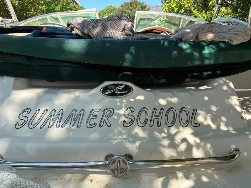 Slide: The Image of 2005 Sea Ray 200 Sundeck boat with "Summer School" lettering. - 12