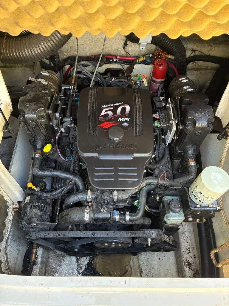 Slide: The Image of Engine compartment of a 2005 Sea Ray 200 Sundeck with MerCruiser 5.0 MPI engine. - 15