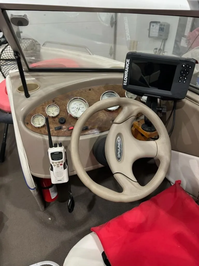 Slide: The Image of 2003 Bayliner 195 Bowrider helm with instruments and GPS. - 10