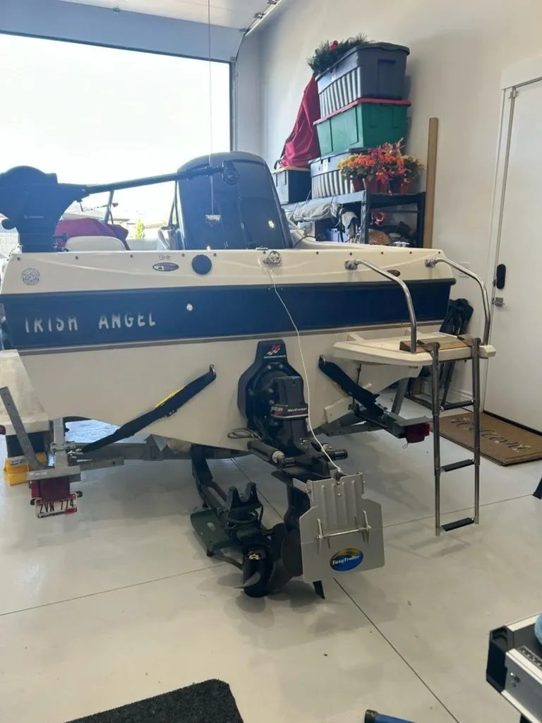 Slide: The Image of 2003 Bayliner 195 Bowrider boat in garage with accessories. - 7
