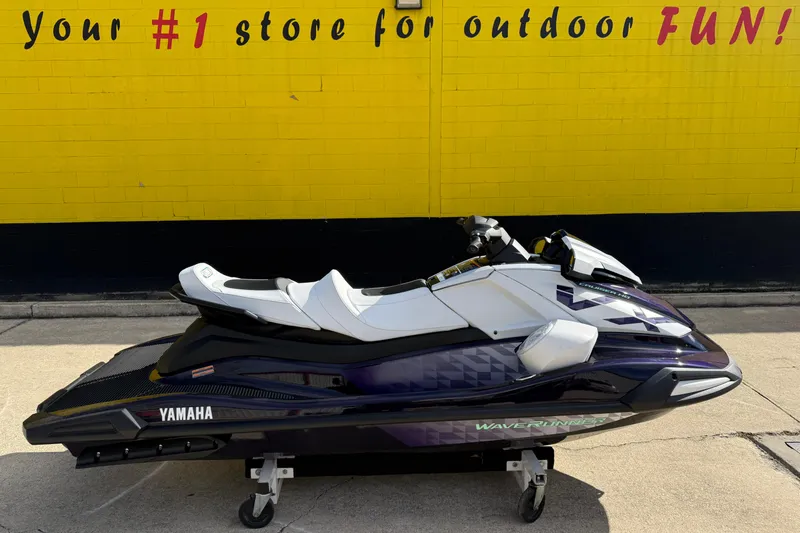 The Image of 2026 Yamaha WaveRunner VX Cruiser HO against a vibrant yellow wall, showcasing sleek design. - 1