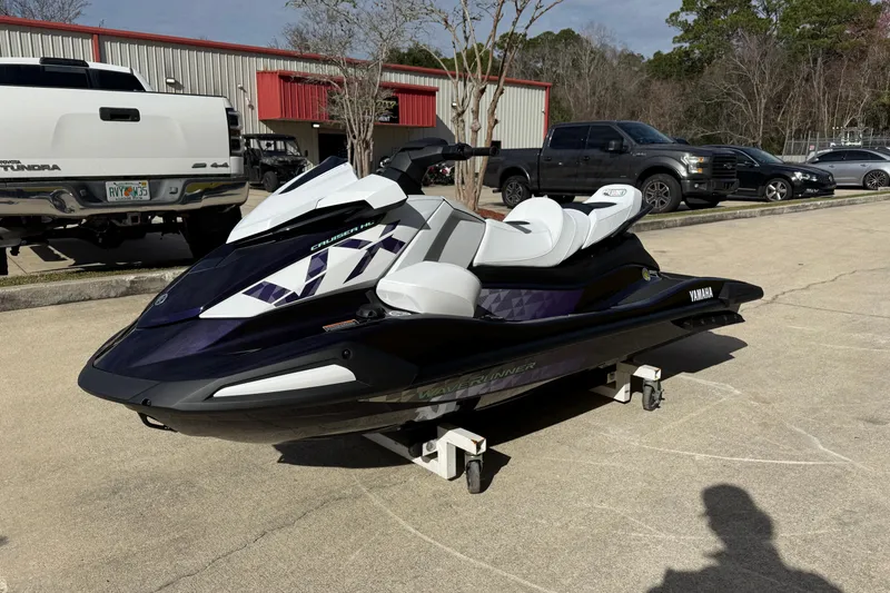 Slide: The Image of 2026 Yamaha WaveRunner VX Cruiser HO parked outdoors on a sunny day. - 6