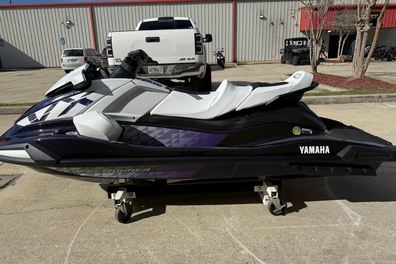 Slide: The Image of 2026 Yamaha WaveRunner VX Cruiser HO parked outdoors on a sunny day. - 7