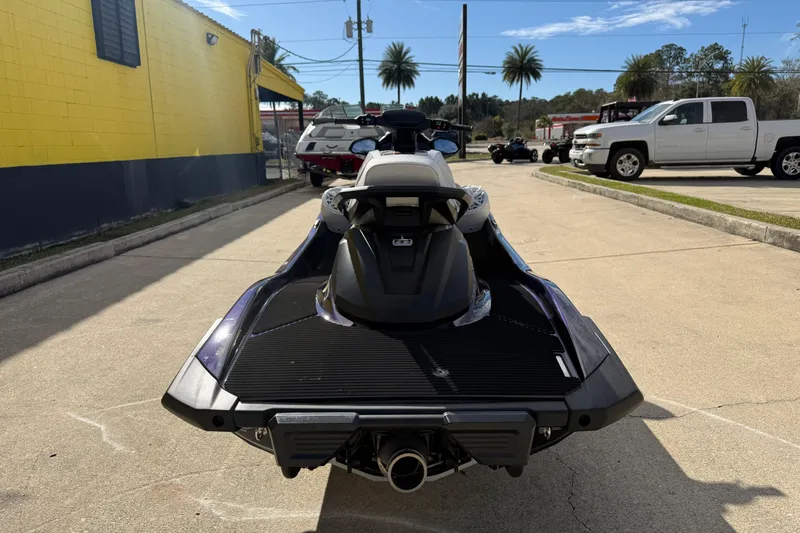 Slide: The Image of 2026 Yamaha WaveRunner VX Cruiser HO parked outdoors, rear view. - 9