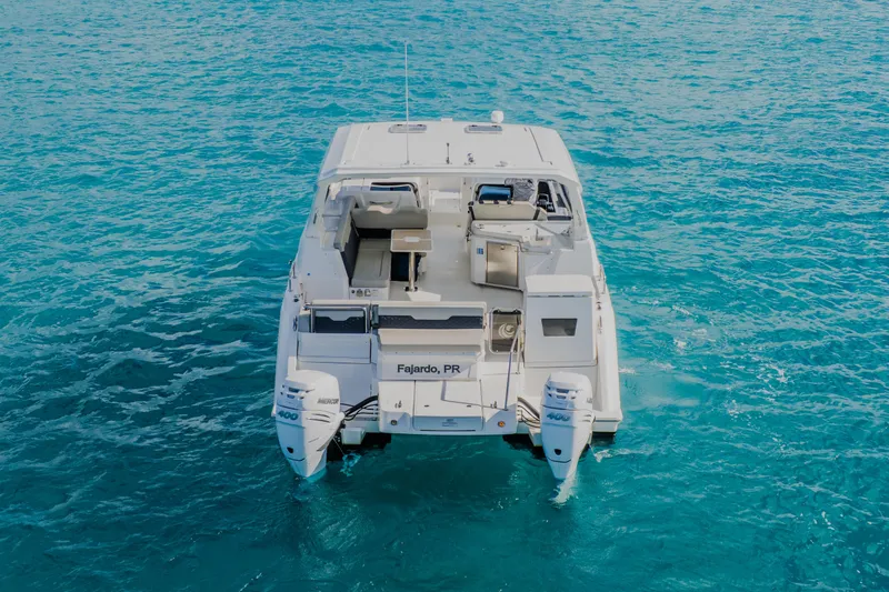 Slide: The Image of 2023 Aquila 36 Sport boat on clear blue water, Fajardo, PR. - 12