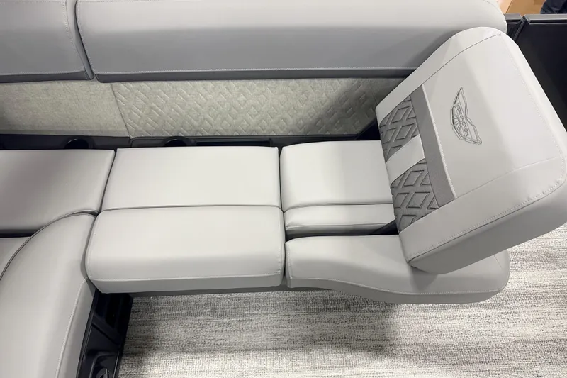 Slide: The Image of 2026 Bennington 22 M Swingback boat seat with gray upholstery and diamond pattern design. - 10