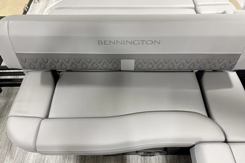 Slide: The Image of 2026 Bennington 22 M Swingback boat seat with elegant gray upholstery and diamond pattern. - 12