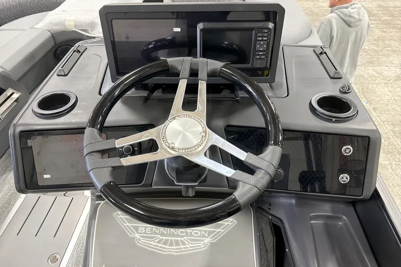 Slide: The Image of Steering console of 2026 Bennington 22 M Swingback with modern controls and displays. - 14