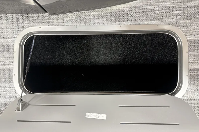 Slide: The Image of Storage compartment of 2026 Bennington 22 M Swingback boat, featuring sleek design and durable materials. - 16