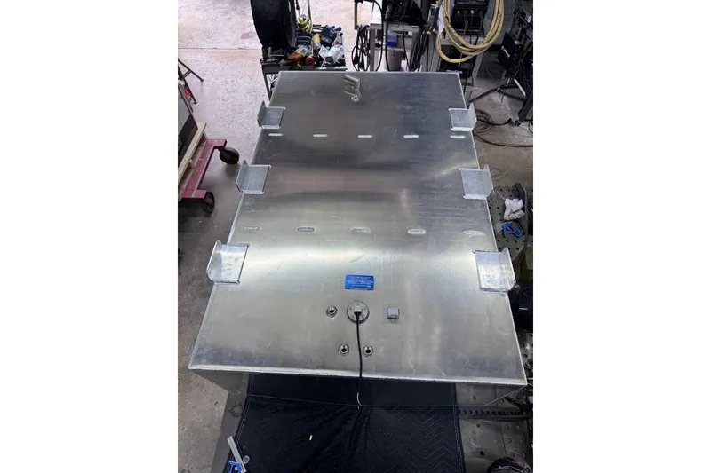 Slide: The Image of Aluminum boat fuel tank for 1995 Mako 293 Walk Around, displayed in a workshop setting. - 13