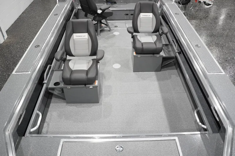 Slide: The Image of 2026 Thunder Jet 209 Rush OT boat interior with two cushioned seats and sleek design. - 30
