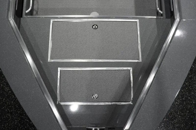 Slide: The Image of 2026 Thunder Jet 209 Rush OT boat deck with storage compartments. - 31