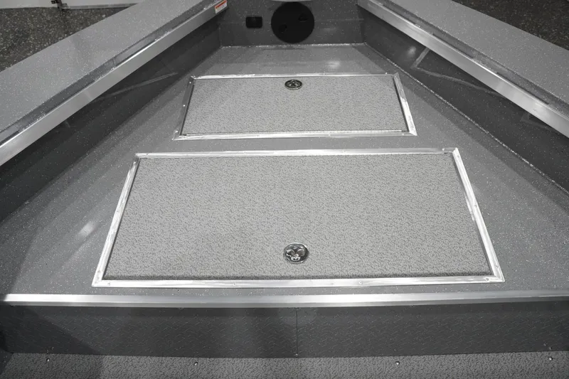 Slide: The Image of 2026 Thunder Jet 209 Rush OT boat interior with storage compartments. - 33