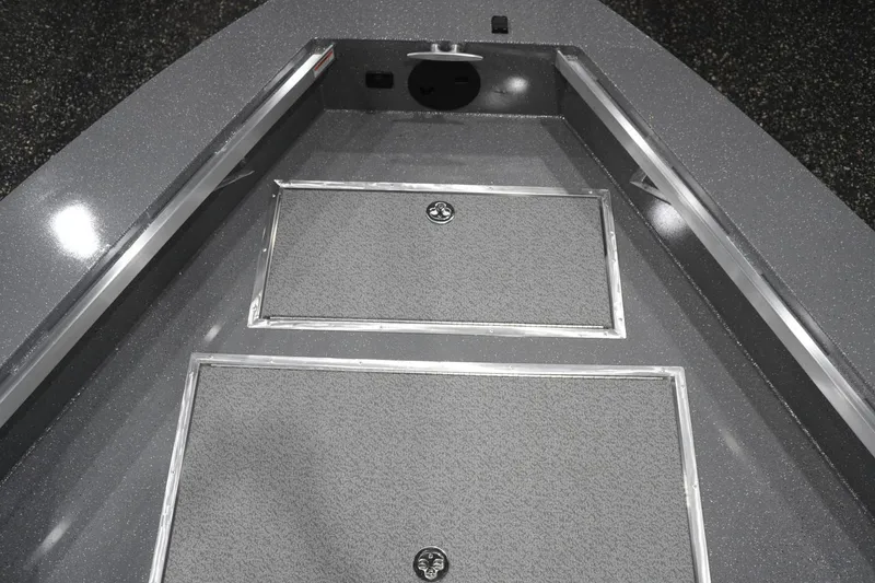 Slide: The Image of Interior view of 2026 Thunder Jet 209 Rush OT boat with storage compartments. - 34