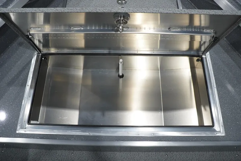 Slide: The Image of Open storage compartment in 2026 Thunder Jet 209 Rush OT boat. - 35