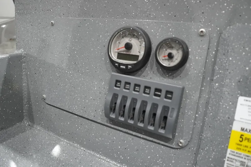 Slide: The Image of Dashboard of 2026 Thunder Jet 209 Rush OT boat with gauges and switches. - 46