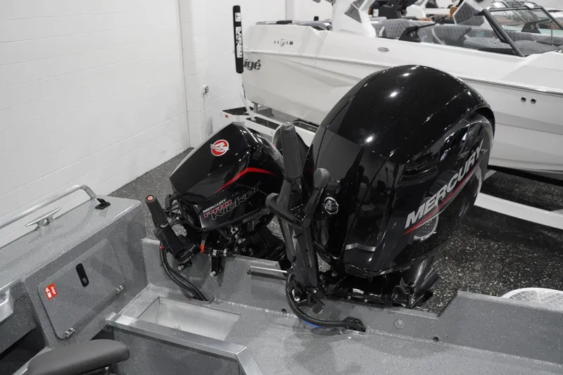Slide: The Image of 2026 Thunder Jet 209 Rush OT boat with Mercury outboard motor in showroom. - 52
