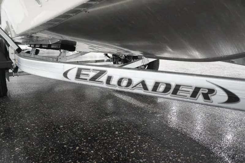 Slide: The Image of Underneath view of 2026 Thunder Jet 209 Rush OT on EZ Loader trailer. - 8