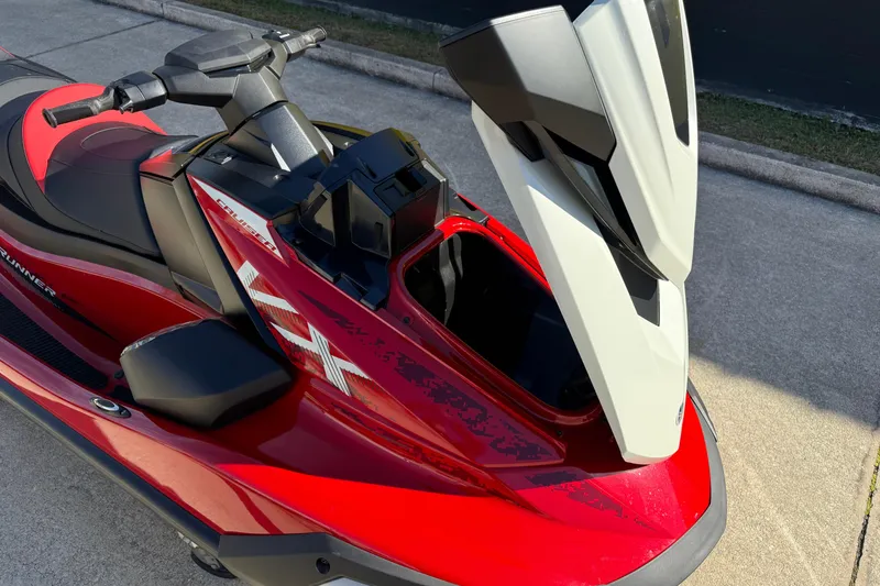 Slide: The Image of 2026 Yamaha WaveRunner VX Cruiser in red, showcasing open storage compartment. - 13