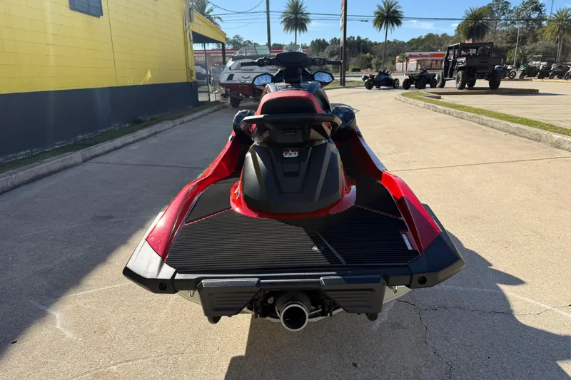 Slide: The Image of 2026 Yamaha WaveRunner VX Cruiser in red, parked outdoors on a sunny day. - 9