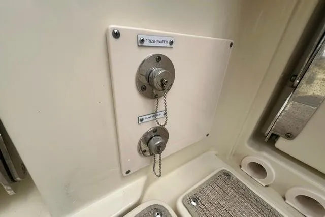 Slide: The Image of Fresh and raw water inlets on 2024 Chris-Craft Catalina 30 boat. - 22