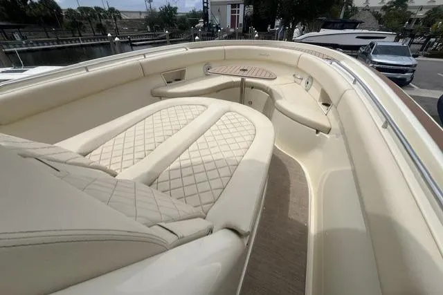Slide: The Image of 2024 Chris-Craft Catalina 30 boat interior with luxurious seating and elegant design. - 32