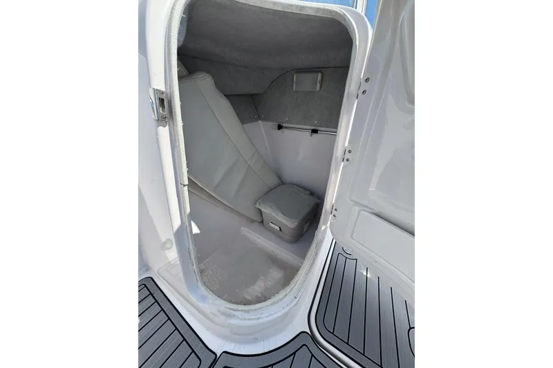Slide: The Image of Interior cabin of 2016 PROLINE 23DC boat with seating and storage. - 12