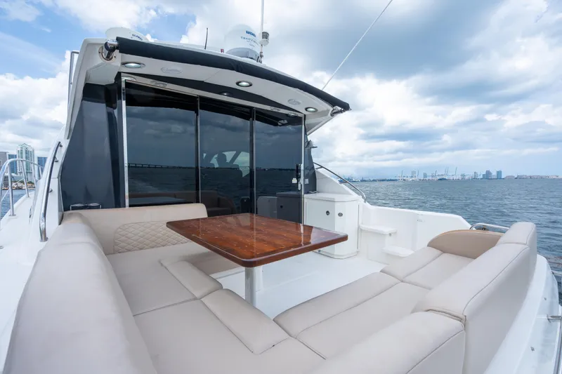 Slide: The Image of Luxurious 2017 Sea Ray Sundancer 510 yacht with spacious outdoor seating and ocean view. - 10
