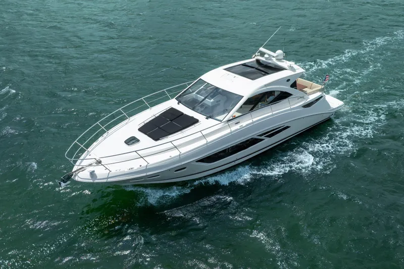 Slide: The Image of 2017 Sea Ray Sundancer 510 yacht cruising on open water. - 3