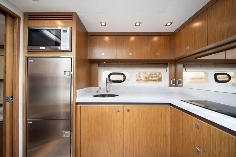 Slide: The Image of Luxurious kitchen interior of 2017 Sea Ray Sundancer 510 yacht with modern appliances. - 30