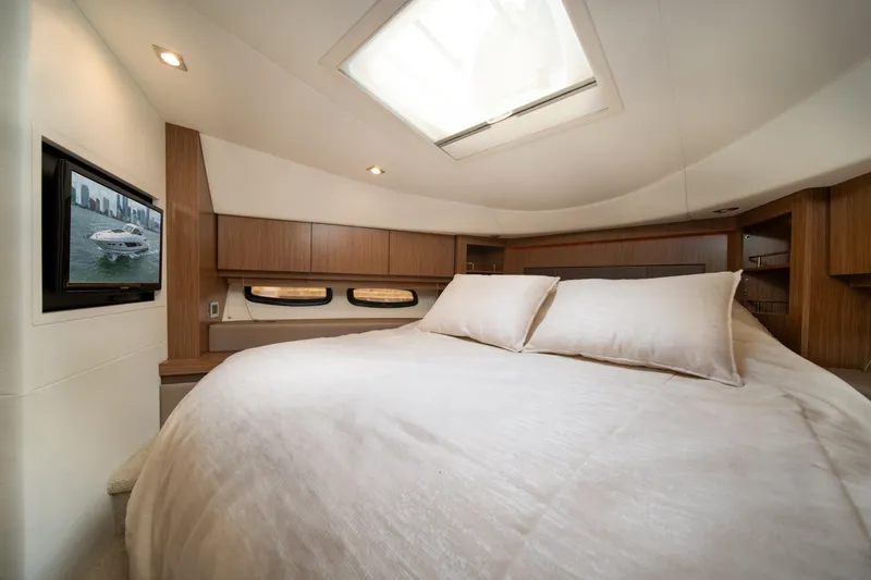 Slide: The Image of Luxurious 2017 Sea Ray Sundancer 510 yacht bedroom with skylight and TV. - 33