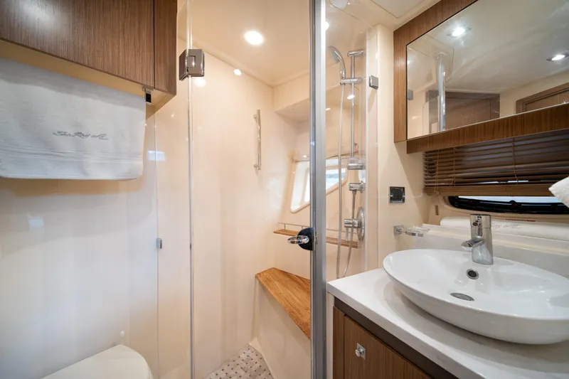 Slide: The Image of Luxurious bathroom in 2017 Sea Ray Sundancer 510 yacht with modern fixtures and elegant design. - 34