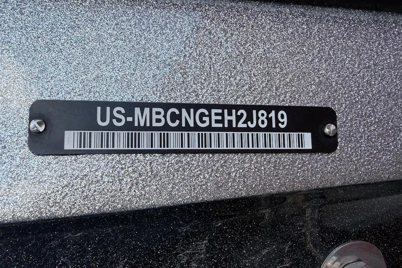 Slide: The Image of 2019 MasterCraft X22 boat identification plate with serial number and barcode. - 19